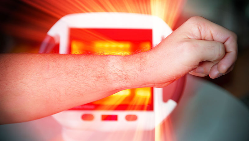 Patient receiving Electromagnetic Infrared Therapy as part of the neuropathy treatment protocol at Peninsula RSI Chiropractic Wellness Center in Redwood City