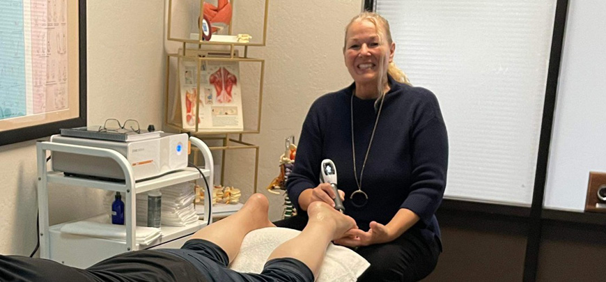 Patient receiving Shockwave Therapy as part of the neuropathy treatment protocol at Peninsula RSI Chiropractic Wellness Center in Redwood City